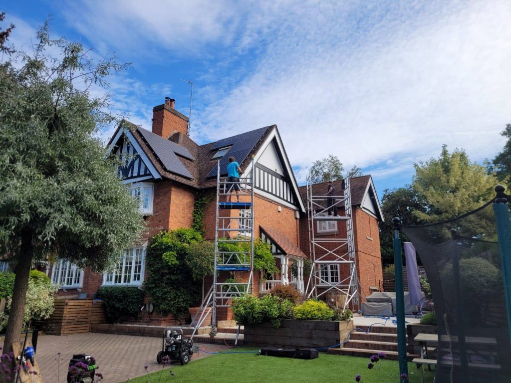 Before and after roof cleaning at a residential property in Leicestershire, showing cleaned roof tiles