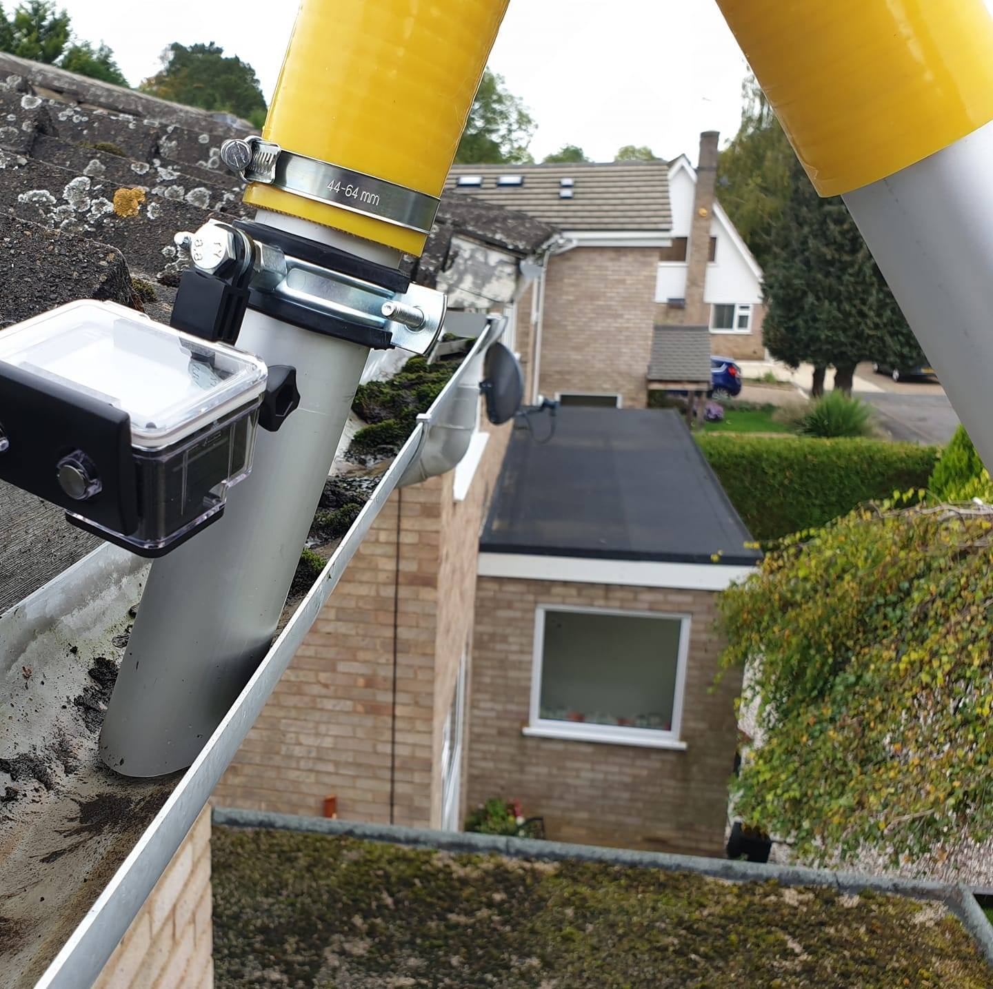 Gutter clearing in progress at a residential property in Leicester, Leicestershire